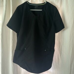 Black SCRUBSTAR scrub top.